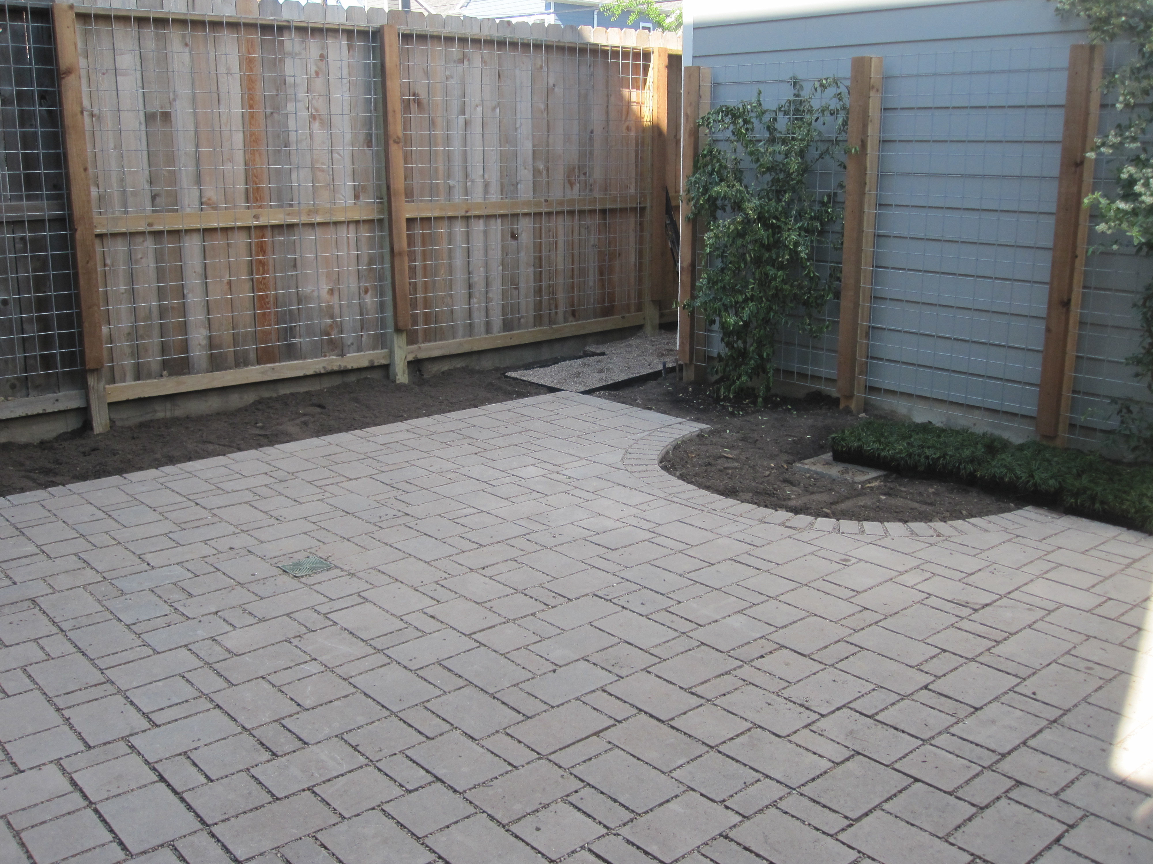 Installing a water-permable patio: Turning a little yard ...